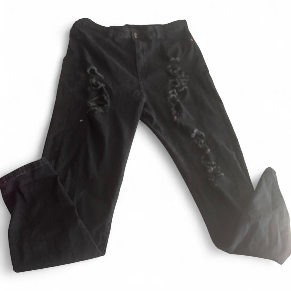 Edgy black distressed skinny jeans in a flattering plus size 2X fit